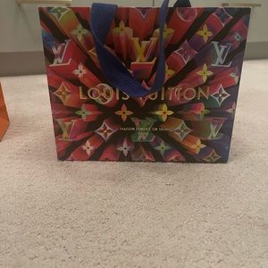 Authentic Louis Vuitton shopping bag
